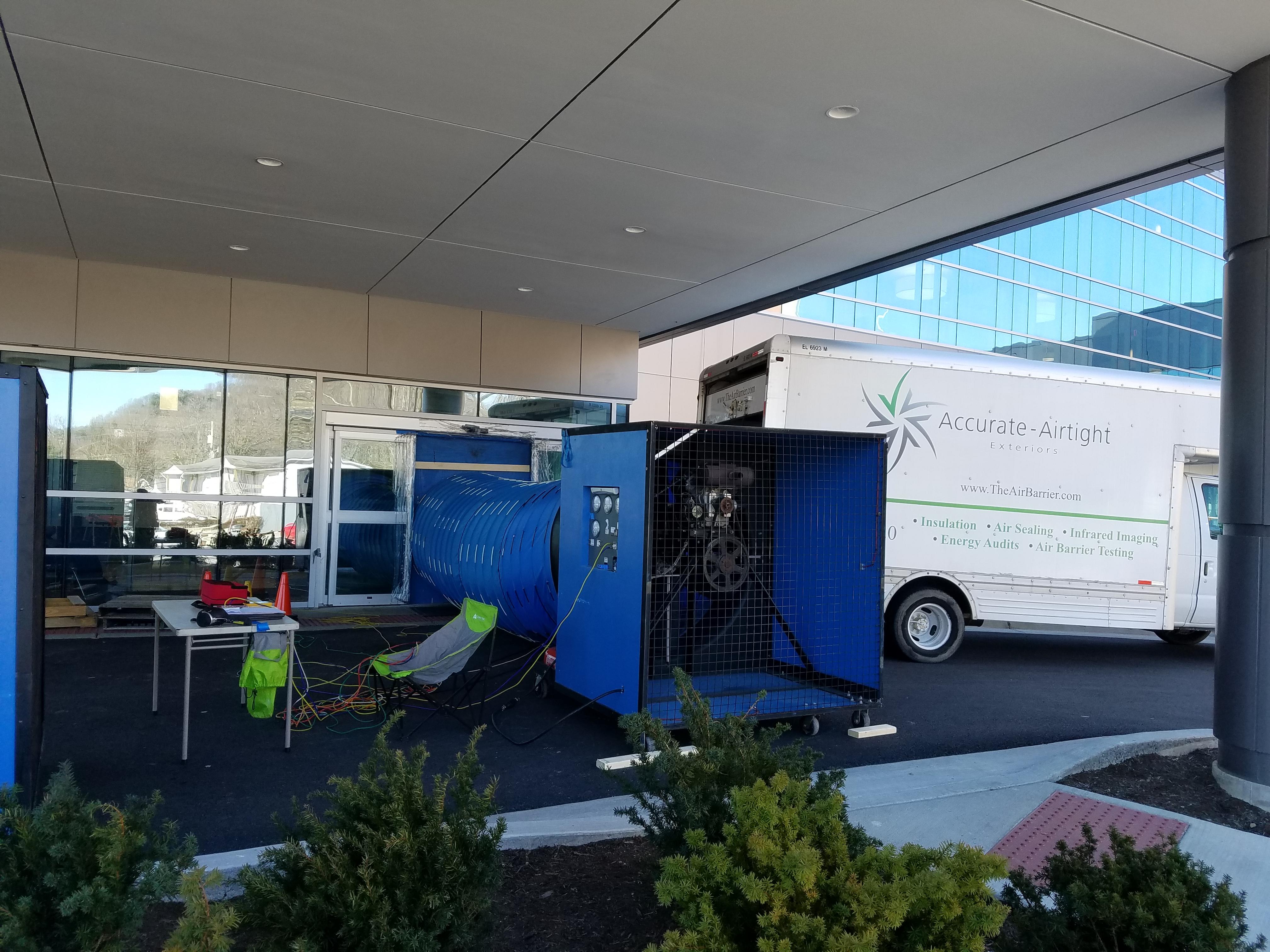 Commercial Blower Door Equipment Hooked Up To The Hospital's Main Entrance