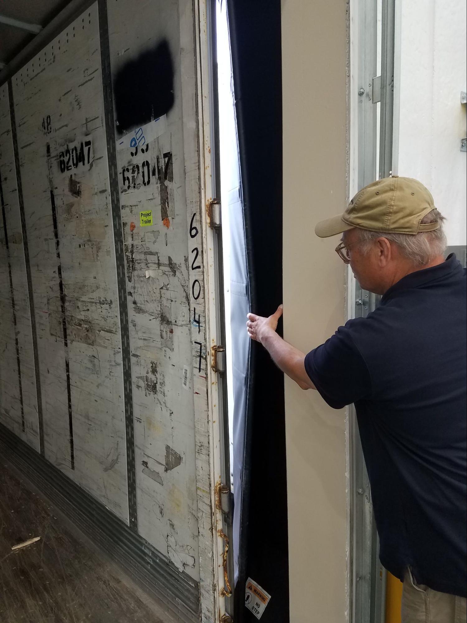 Accurate-Airtight Exteriors Expert Inspecting Commercial Building's Air Barrier