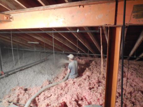 Crew Blowing Cellulose Insulation