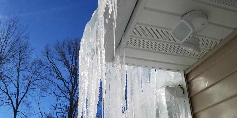 Ice Dam Forming On House Roof