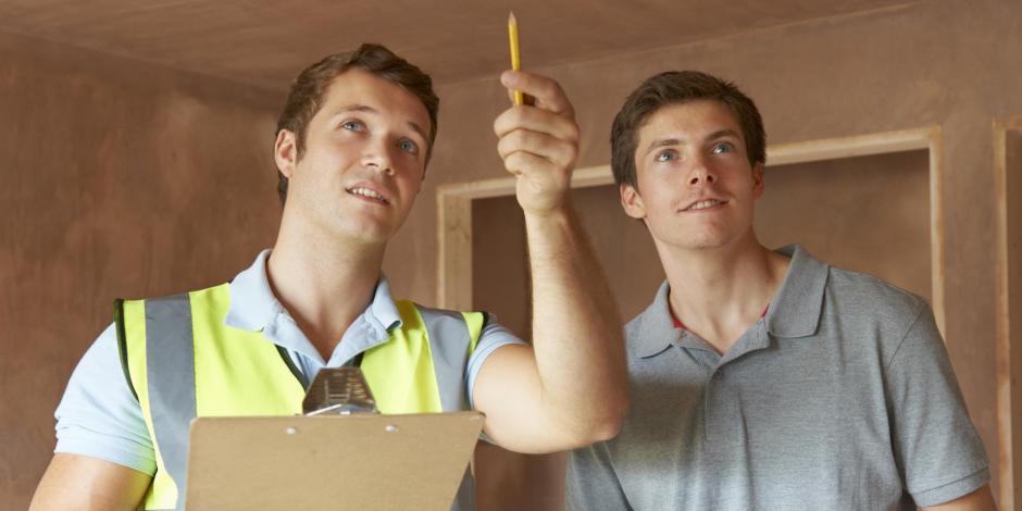 Contractor and homeowner going over checklist