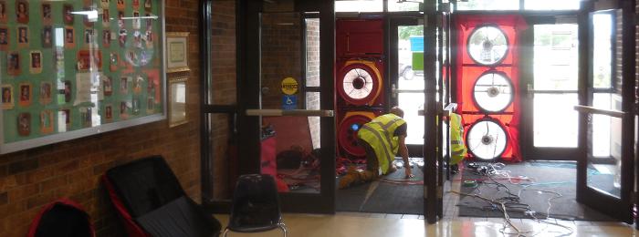 Blower Door Testing At A School