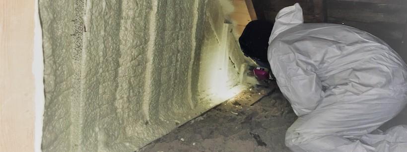 Spray Foam Insulation Accurate-Airtight Exteriors Worker Applying Spray Foam Insulation