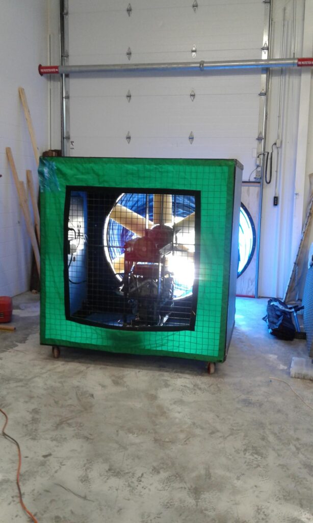 G54 blower door setup in process.