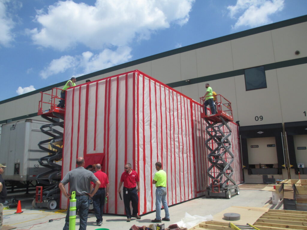 This blower door test helped to determine the design of the loading dock to be installed in planned new warehouse construction.