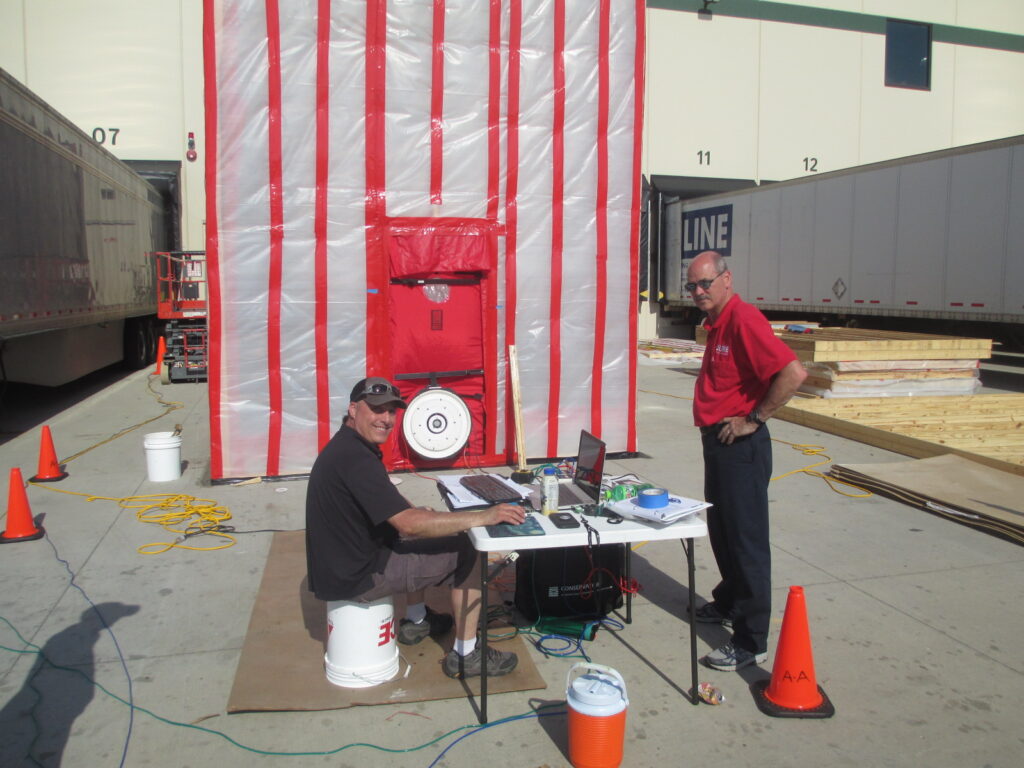 A mock-up was built to blower door test a loading dock at a large warehouse facility.