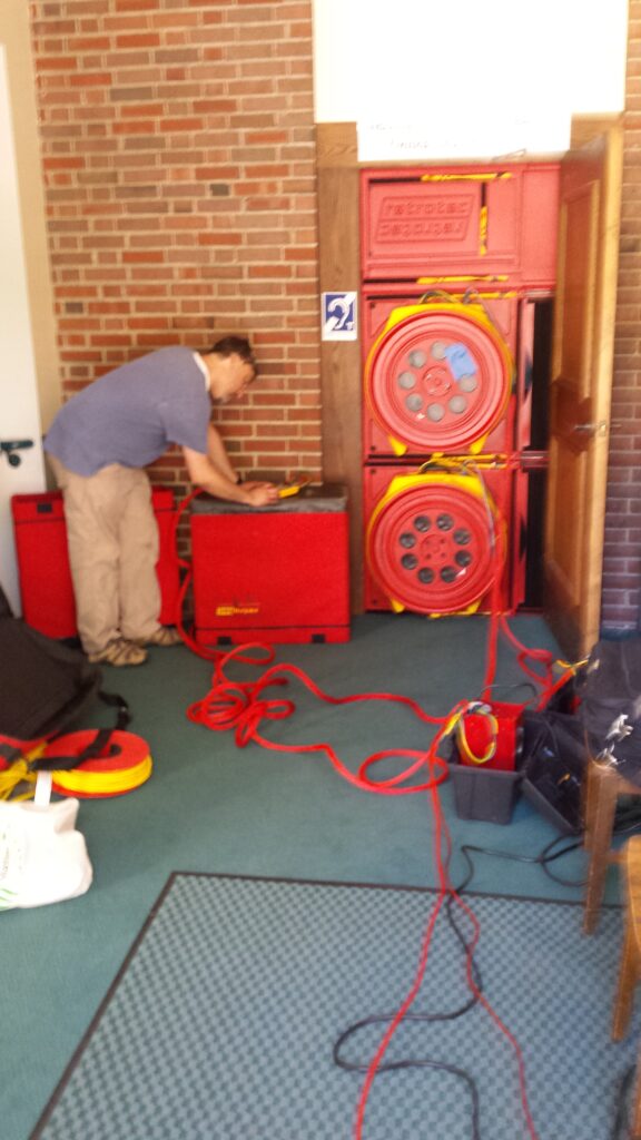 Two Retrotec blower door fans used to test a commercial building.