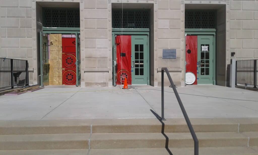 Three blower doors used to test a multi-floor municipal building.