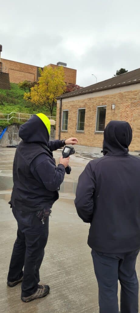 Infrared camera inspection of a building exterior.