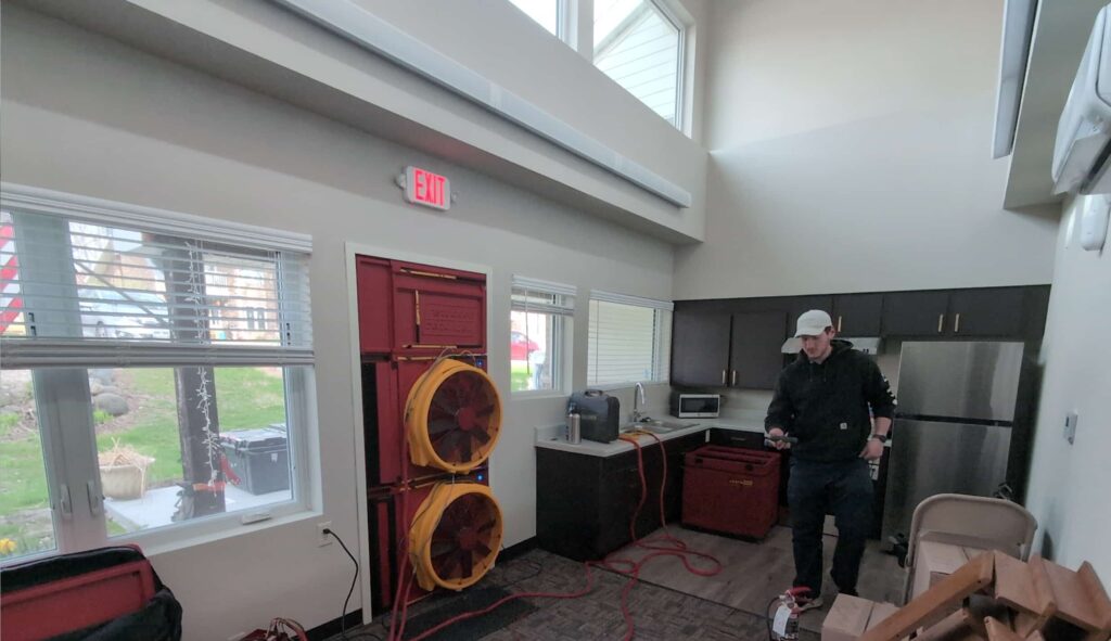 Accurate-Airtight team setting-up equipment in commercial building for a Commercial Building Inspection