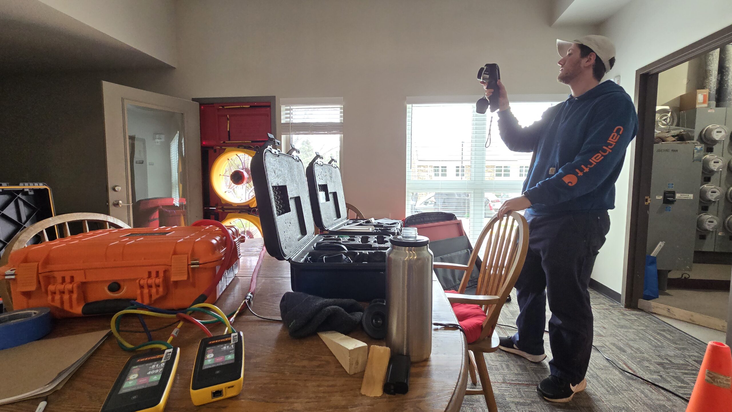 Infrared camera in use during blower door test.