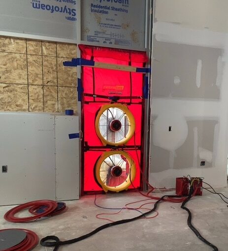 Commercial blower door test.