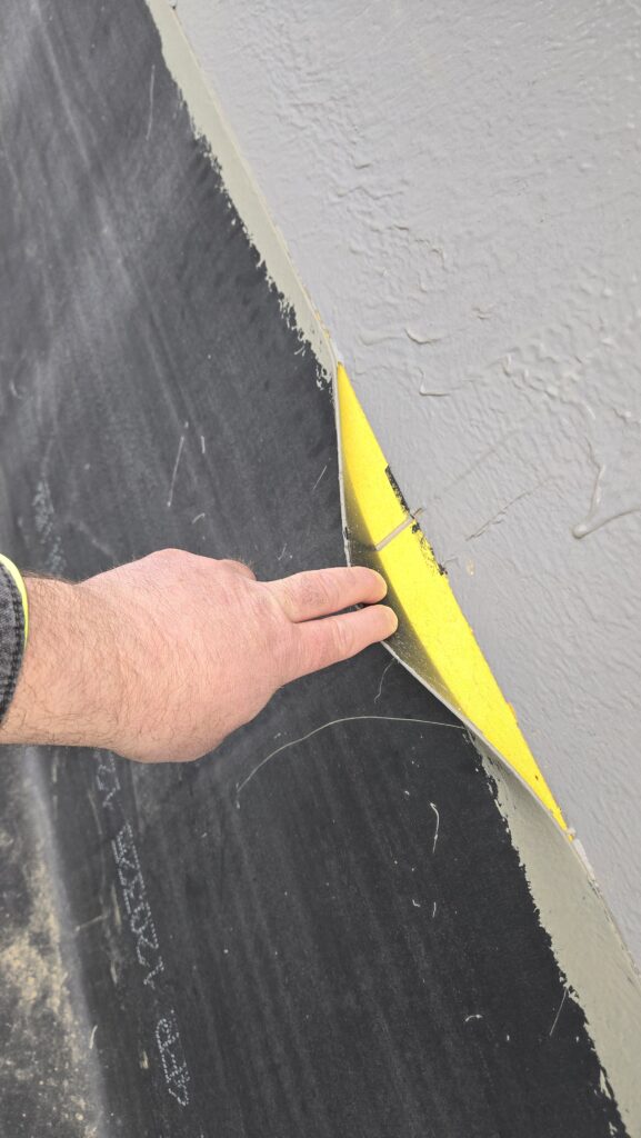 Inspection of the wall assembly of a building.