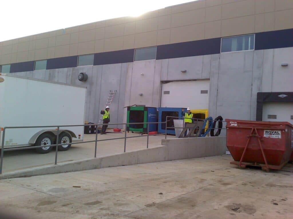 G54 blower door equipment at air barrier test site.