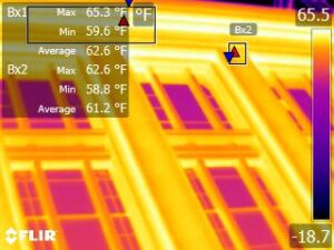 Infrared camera image showing the exterior of a municipal building.