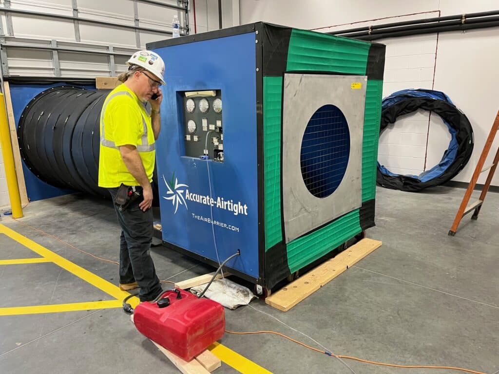Blower door test with trailer mounted gas fan