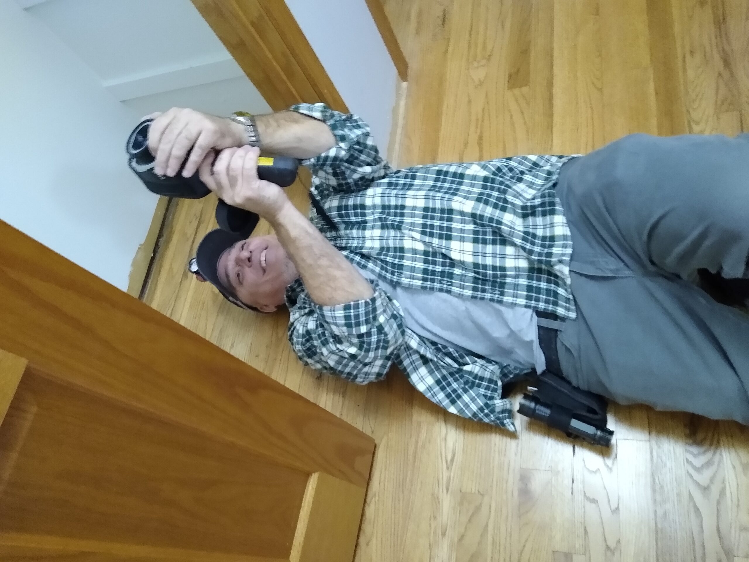 Energy auditor going to great lengths to capture high value infrared image from unique vantage point.
